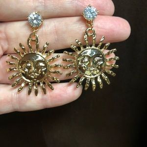 Gold sunburst dangle earrings